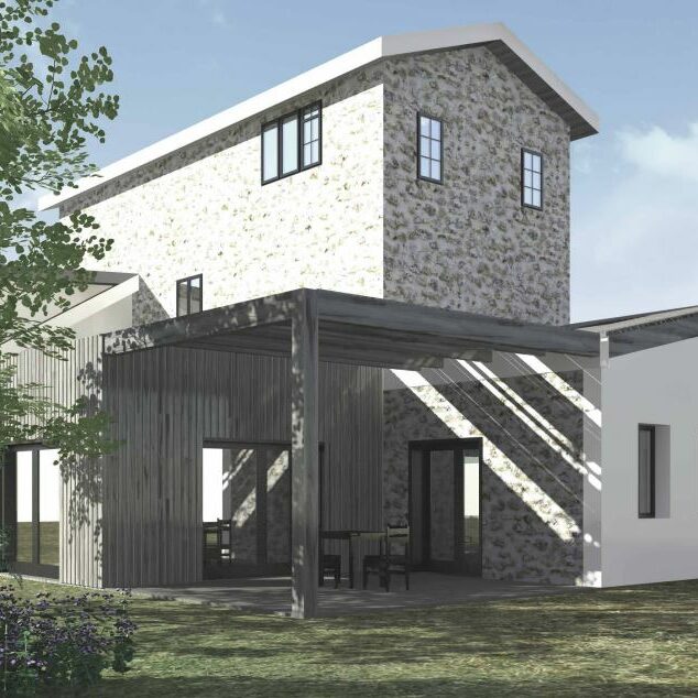 Rénovation d'une maison en pierres naturelles et extension en bois avec terrasse sous une pergola cosy